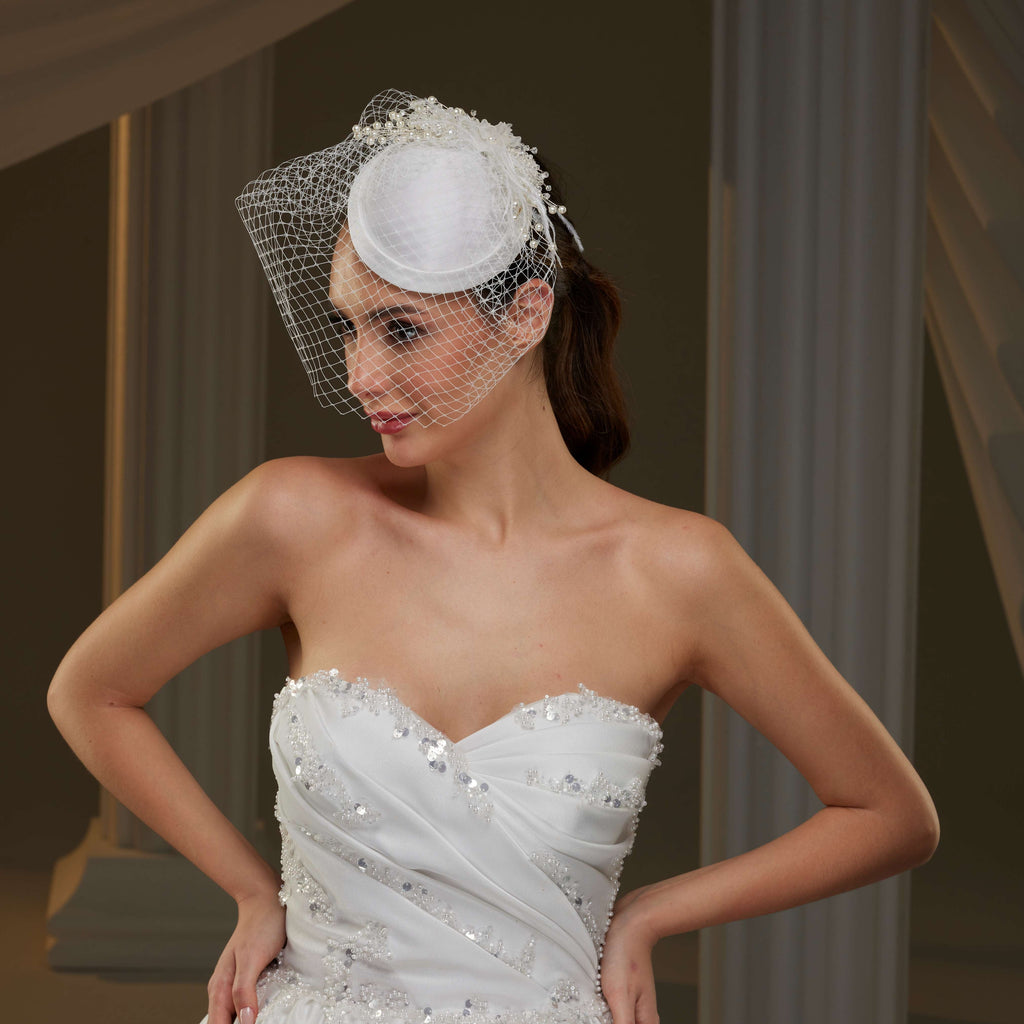 Elegant  Bridal Fascinator with Birdcage Veil, Pearls & Feathers