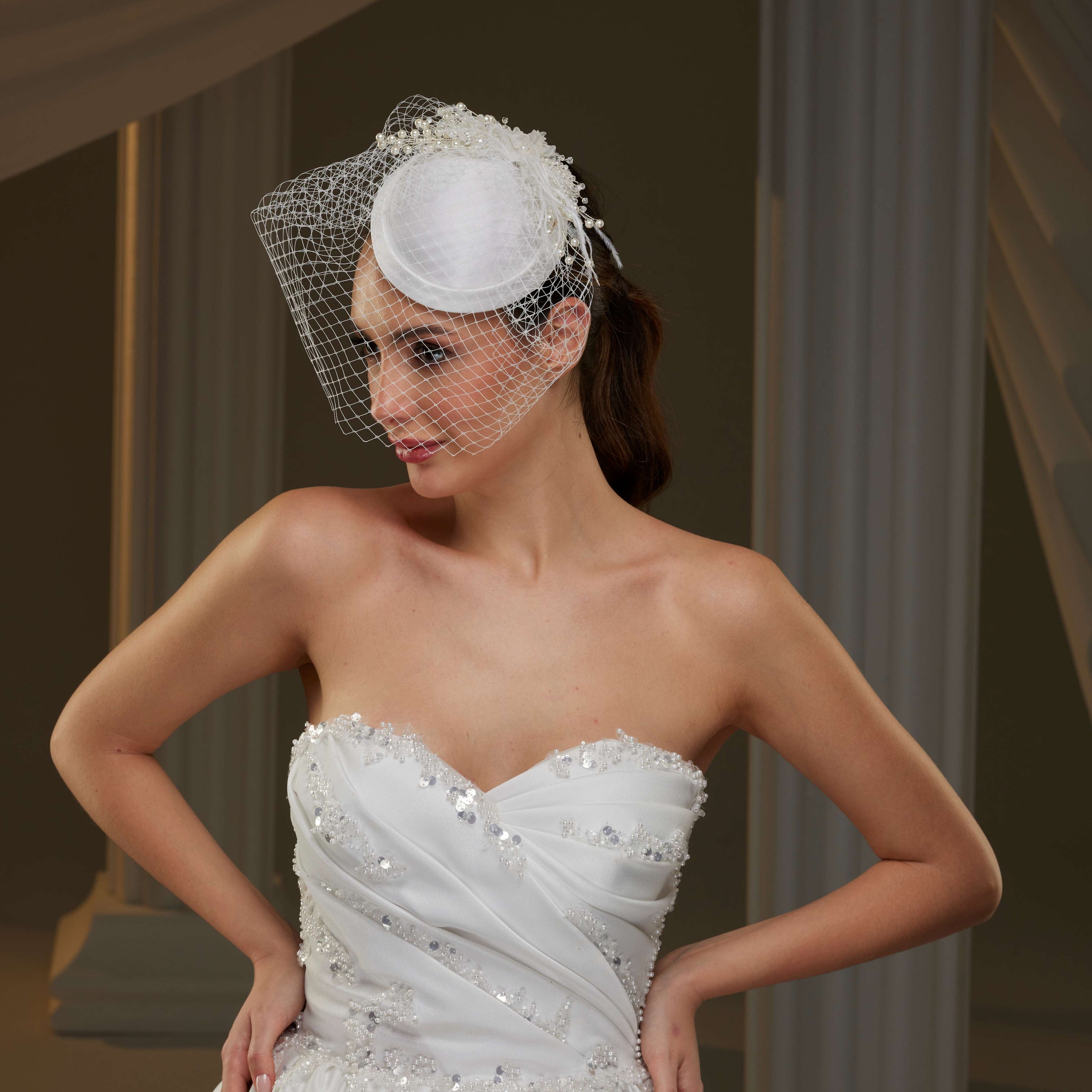 Elegant  Bridal Fascinator with Birdcage Veil, Pearls & Feathers