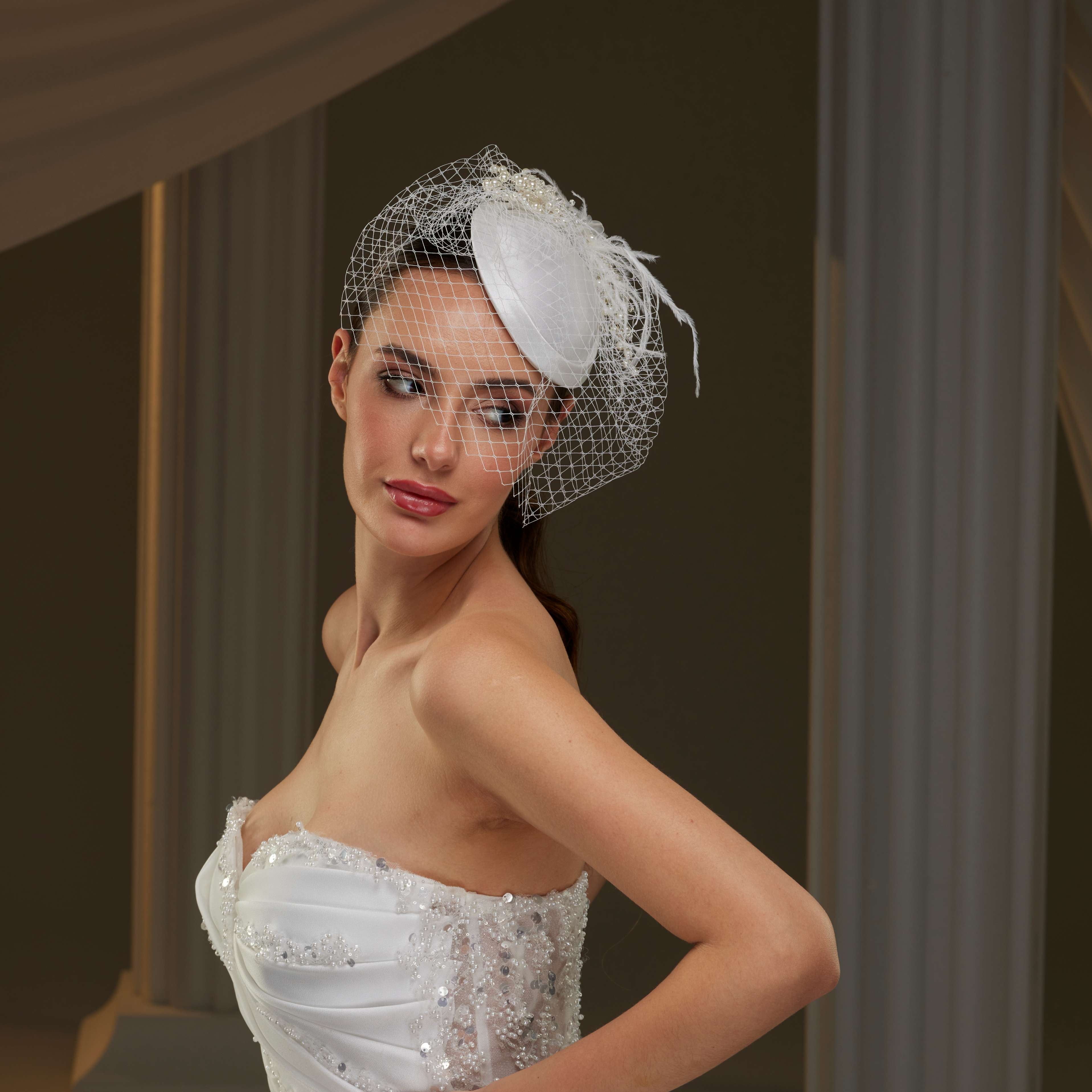 Elegant  Bridal Fascinator with Birdcage Veil, Pearls & Feathers